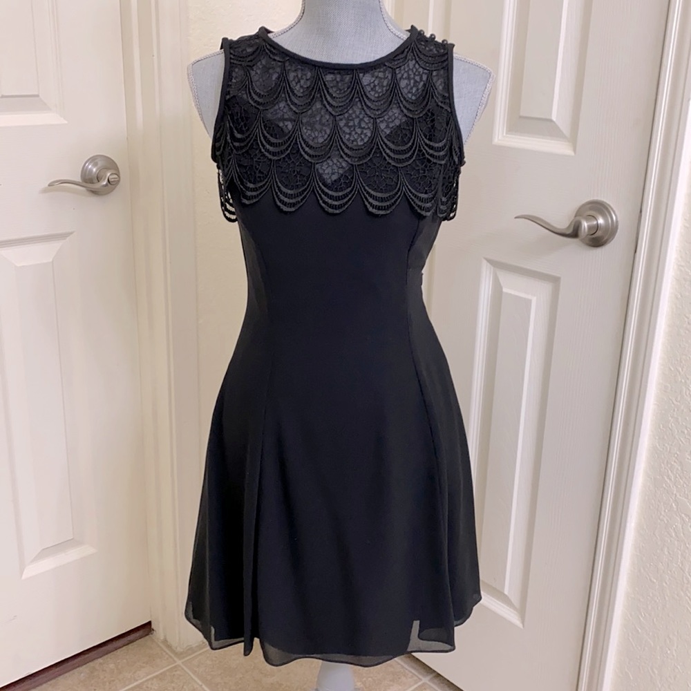 Black cocktail dress by Scott McClintock